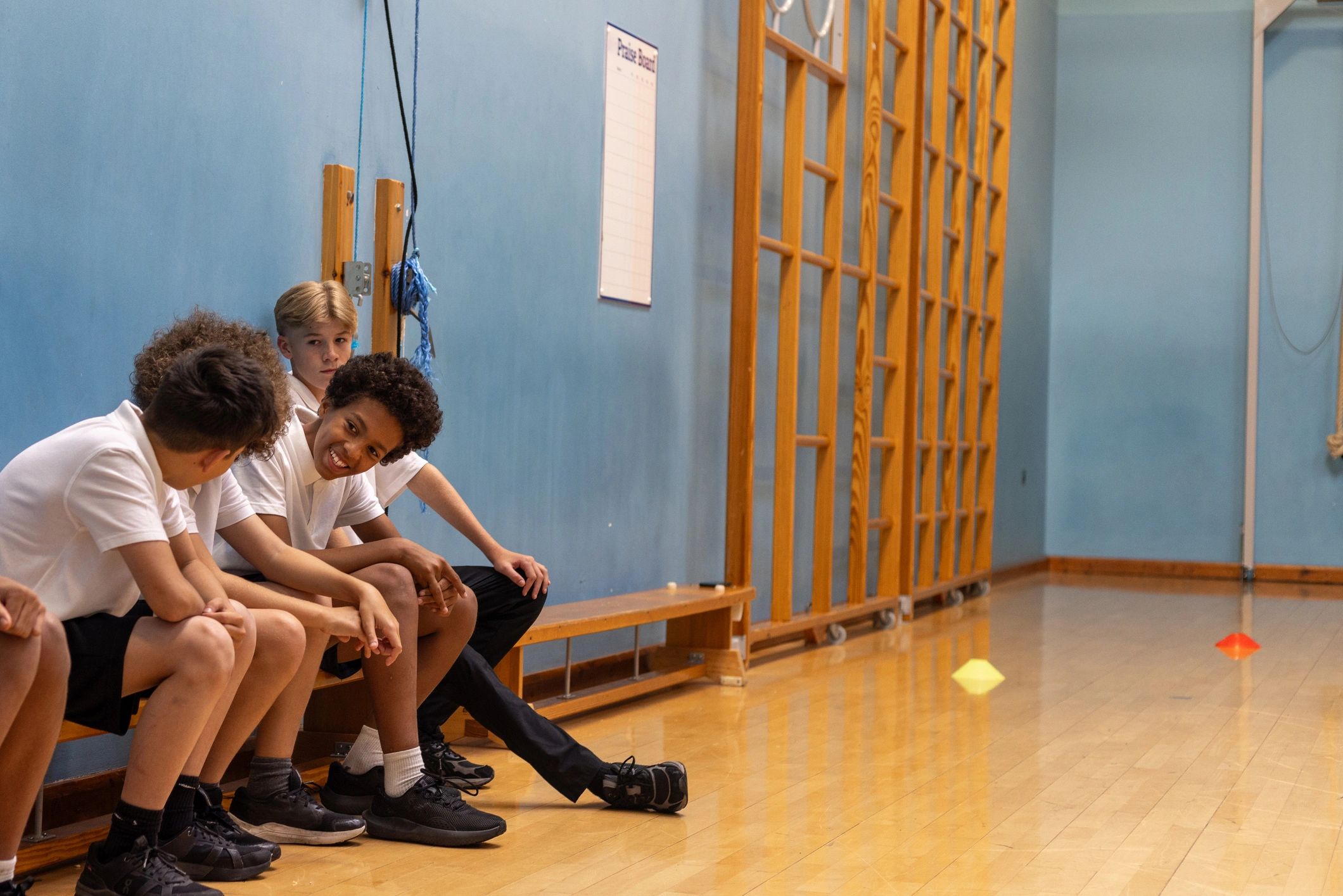 Young athletes gathered together in a sports setting